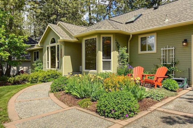 4307 S Apollo St, Spokane, WA 99223 - entrance to property featuring roof with shingles