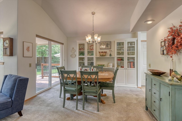4307 S Apollo St, Spokane, WA 99223 - dining space featuring a chandelier, light carpet, and vaulted ceiling
