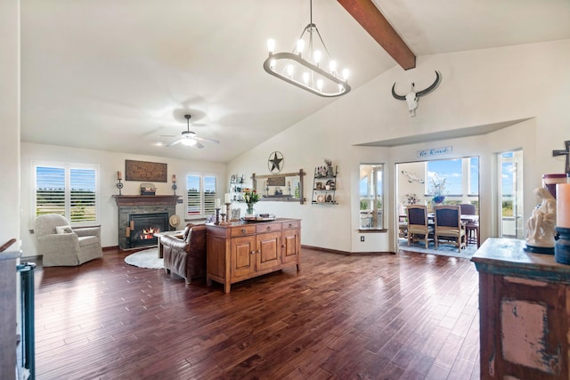 14410 W Jacobs Rd, Spokane, WA 99224 - living room featuring ceiling fan, beamed ceiling, dark wood-style flooring, a stone fireplace, and high vaulted ceiling