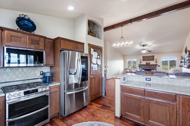 14410 W Jacobs Rd, Spokane, WA 99224 - kitchen featuring appliances with stainless steel finishes, open floor plan, ceiling fan, dark wood-style floors, and recessed lighting