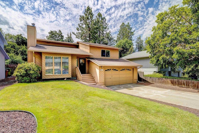 4112 E 11th Ave, Spokane, WA 99202 - split level home featuring a chimney, driveway, and a shingled roof