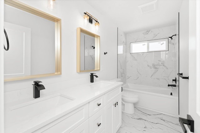 2077 W Walker Ave, Spokane, WA 99208 - full bathroom with double vanity, marble finish floors, washtub / shower combination, and toilet