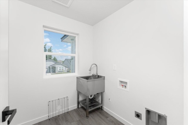 2077 W Walker Ave, Spokane, WA 99208 - laundry area with washer hookup, wood finished floors, electric dryer hookup, and baseboards