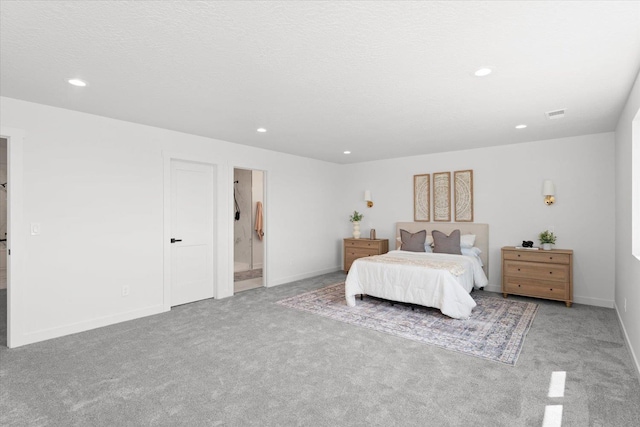 2077 W Walker Ave, Spokane, WA 99208 - carpeted bedroom featuring recessed lighting, baseboards, and ensuite bath