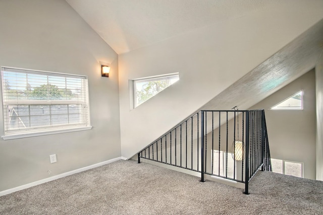 3016 N Walnut Street On A Dead End Street, Spokane, WA 99205 - stairs with carpet, high vaulted ceiling, and baseboards