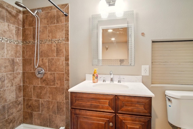 3016 N Walnut Street On A Dead End Street, Spokane, WA 99205 - bathroom featuring vanity, a tile shower, and toilet