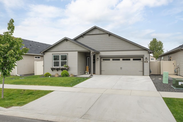 2026 W Parkway Ct, Spokane, WA 99208 - single story home featuring an attached garage and concrete driveway