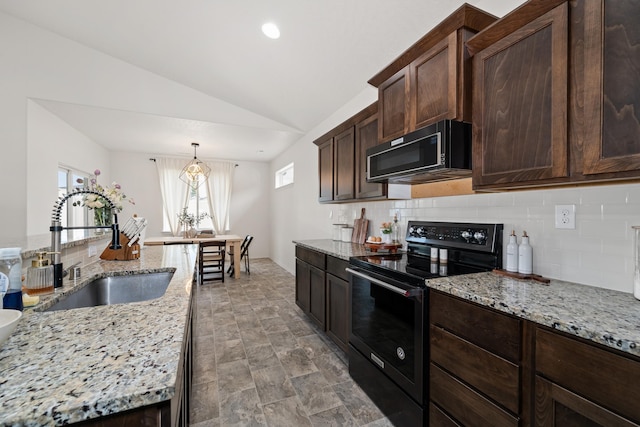 2026 W Parkway Ct, Spokane, WA 99208 - kitchen with black / electric stove, a sink, decorative backsplash, vaulted ceiling, and dark brown cabinets