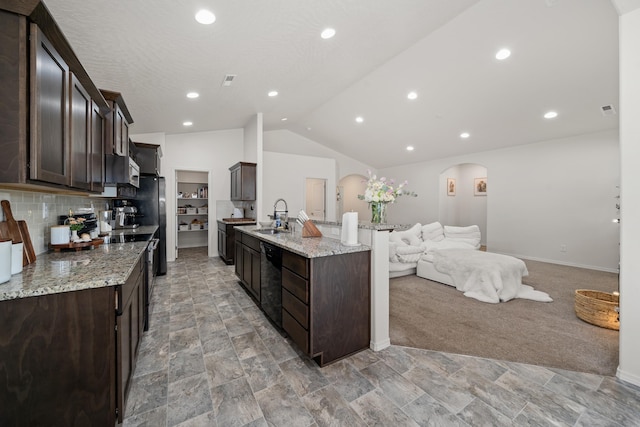 2026 W Parkway Ct, Spokane, WA 99208 - kitchen with arched walkways, a sink, black appliances, dark brown cabinetry, and lofted ceiling