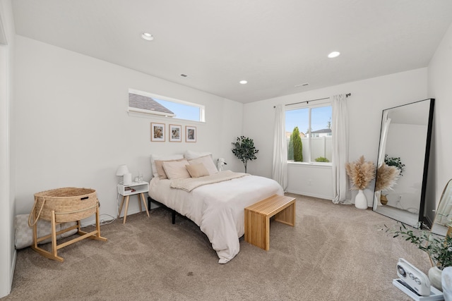 2026 W Parkway Ct, Spokane, WA 99208 - bedroom with multiple windows, light carpet, and recessed lighting