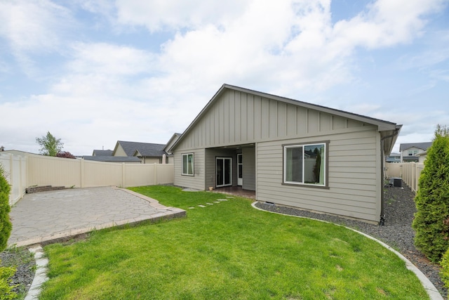 2026 W Parkway Ct, Spokane, WA 99208 - back of property with a patio area and board and batten siding