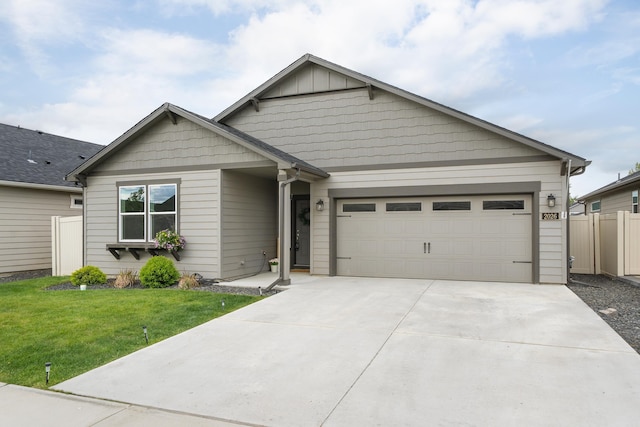 2026 W Parkway Ct, Spokane, WA 99208 - view of front facade featuring concrete driveway and a garage