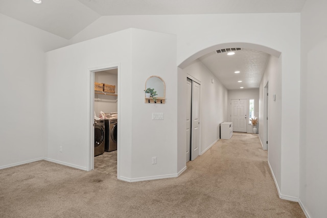 2026 W Parkway Ct, Spokane, WA 99208 - corridor featuring separate washer and dryer, carpet flooring, arched walkways, baseboards, and recessed lighting
