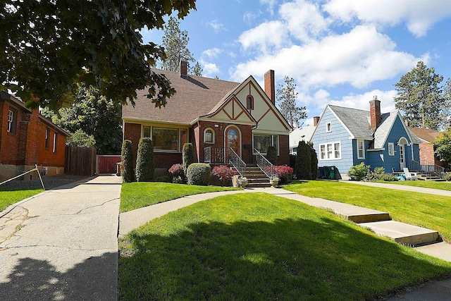 417 W 26th Ave, Spokane, WA 99203 - english style home with brick siding and a chimney