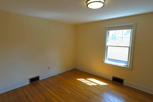 417 W 26th Ave, Spokane, WA 99203 - spare room with wood finished floors and baseboards