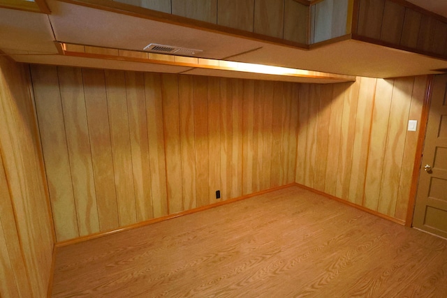 417 W 26th Ave, Spokane, WA 99203 - spare room with wood finished floors and wooden walls