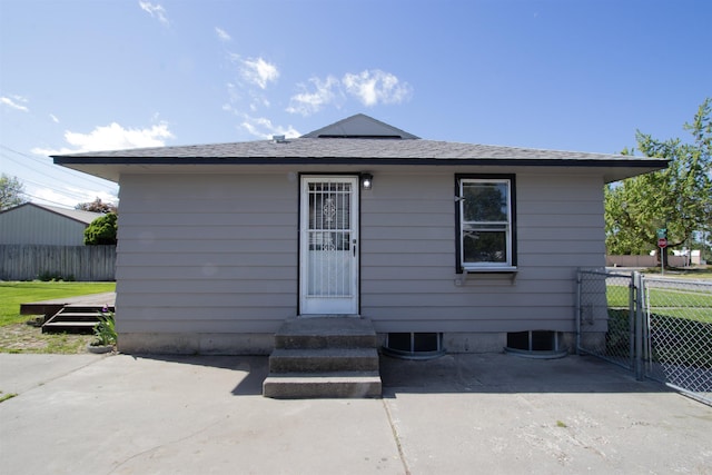 5512 N G St, Spokane, WA 99205 - back of property featuring cooling unit and a patio