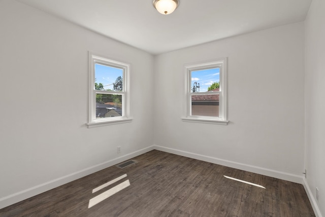 3215 W Longfellow Ave, Spokane, WA 99205 - spare room featuring wood finished floors and baseboards