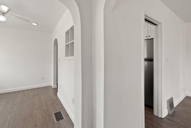 3215 W Longfellow Ave, Spokane, WA 99205 - corridor with arched walkways, dark wood finished floors, recessed lighting, and baseboards