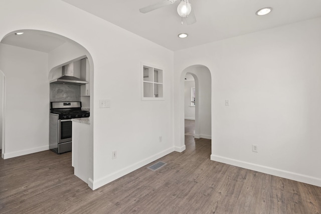 3215 W Longfellow Ave, Spokane, WA 99205 - empty room with ceiling fan, dark wood-style flooring, baseboards, and recessed lighting