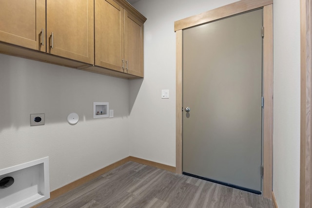 6217 E 11th Ave, Spokane Valley, WA 99212 - laundry room featuring cabinet space, wood finished floors, washer hookup, hookup for an electric dryer, and baseboards
