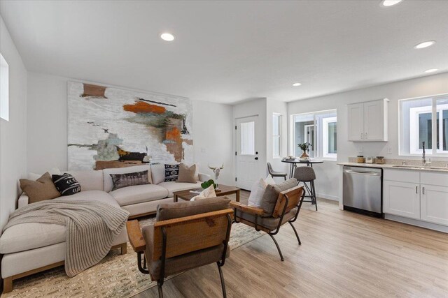 1912 W Buckeye Ave, Spokane, WA 99205 - living area with light wood finished floors, recessed lighting, and healthy amount of natural light