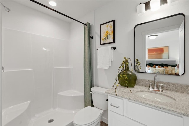 1912 W Buckeye Ave, Spokane, WA 99205 - ensuite bathroom featuring a shower, toilet, vanity, and recessed lighting