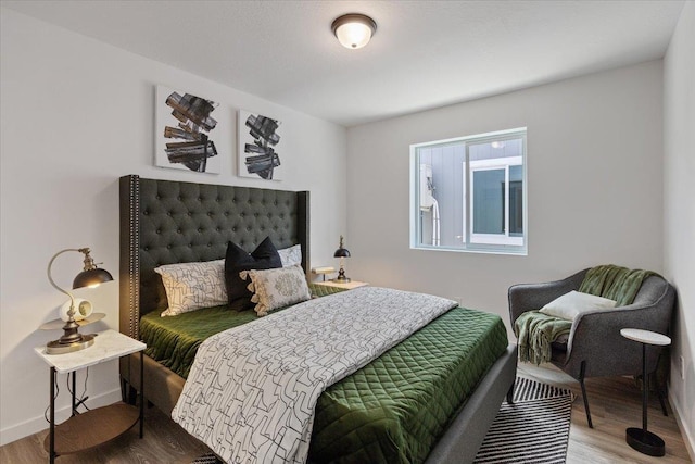 1912 W Buckeye Ave, Spokane, WA 99205 - bedroom featuring wood finished floors and baseboards