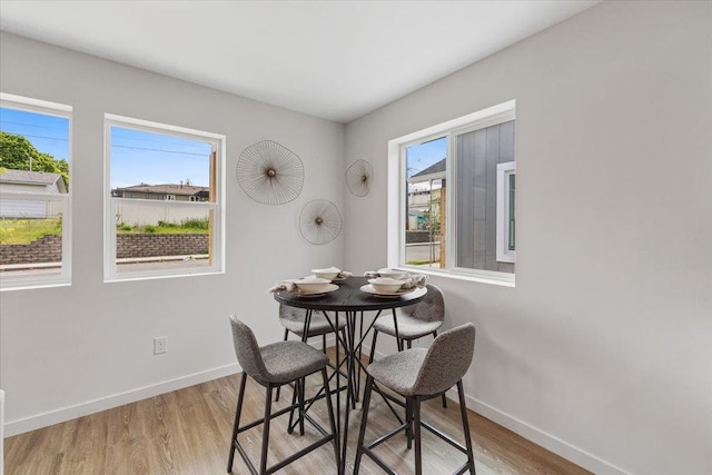 1912 W Buckeye Ave, Spokane, WA 99205 - dining area featuring baseboards and light wood-type flooring