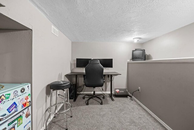 4824 N Stone St, Spokane, WA 99207 - carpeted office space with a textured ceiling and baseboards