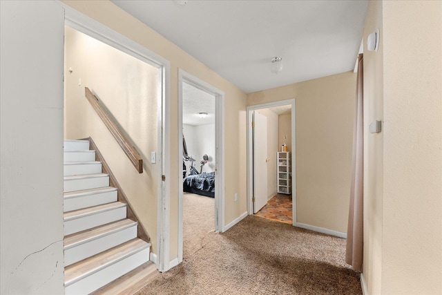 3712 E 12th Ave, Spokane, WA 99202 - hall featuring carpet, stairs, and baseboards