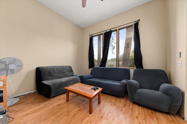 3712 E 12th Ave, Spokane, WA 99202 - living area with vaulted ceiling, light wood finished floors, and ceiling fan