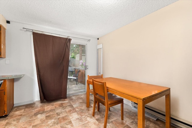3712 E 12th Ave, Spokane, WA 99202 - dining space with a textured ceiling and stone finish flooring