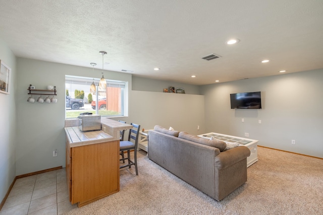 4701 E 13th Ave, Spokane Valley, WA 99212 - living area featuring baseboards, recessed lighting, and a textured ceiling