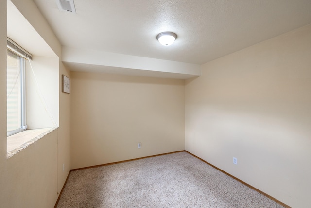 4701 E 13th Ave, Spokane Valley, WA 99212 - carpeted spare room featuring baseboards