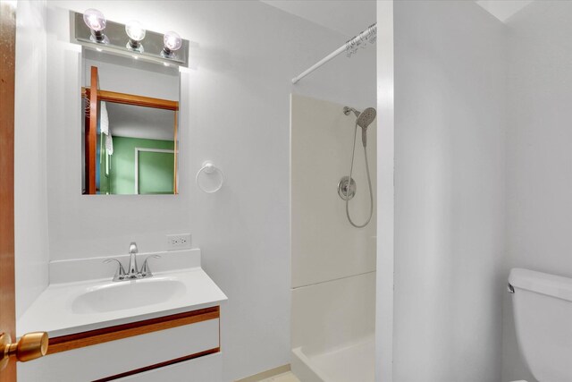 2111 W Mason Rd, Deer Park, WA 99006 - bathroom featuring toilet, a shower, and vanity