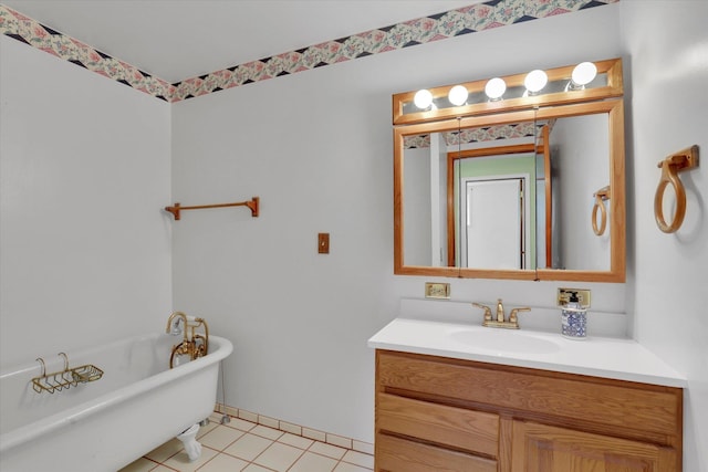 2111 W Mason Rd, Deer Park, WA 99006 - bathroom with a freestanding tub, vanity, and tile patterned floors