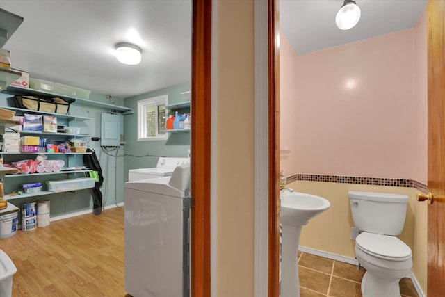 2111 W Mason Rd, Deer Park, WA 99006 - half bath with washer / clothes dryer, toilet, and electric panel