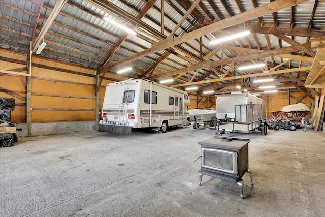 2111 W Mason Rd, Deer Park, WA 99006 - garage featuring a wood stove
