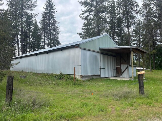 2111 W Mason Rd, Deer Park, WA 99006 - view of side of home with a pole building and an outbuilding