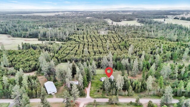 2111 W Mason Rd, Deer Park, WA 99006 - aerial overview of property's location featuring a heavily wooded area