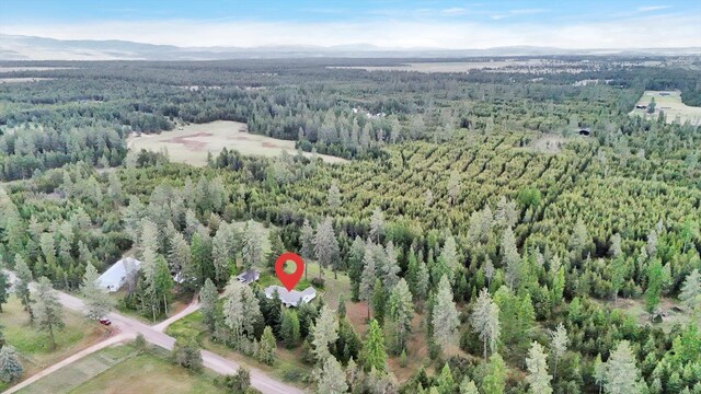 2111 W Mason Rd, Deer Park, WA 99006 - aerial view of property and surrounding area with a heavily wooded area and mountains