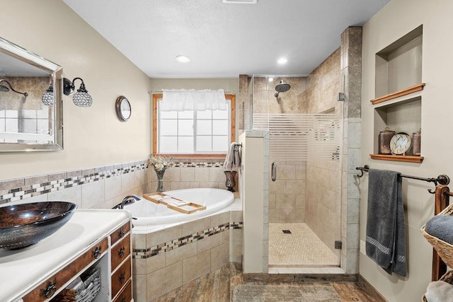 6721 N Washington St, Spokane, WA 99208 - bathroom featuring a bath, a shower stall, and vanity