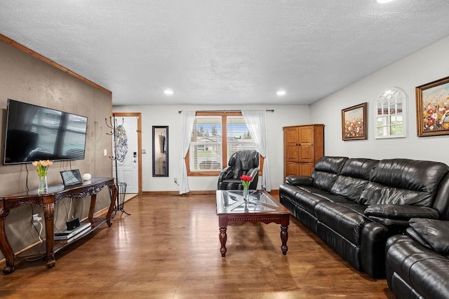 6721 N Washington St, Spokane, WA 99208 - living area featuring wood finished floors, a textured ceiling, and recessed lighting