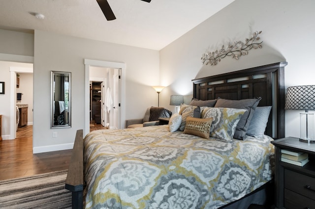 7203 S Tangle Heights Dr, Spokane, WA 99224 - bedroom with wood finished floors, baseboards, ceiling fan, and a spacious closet