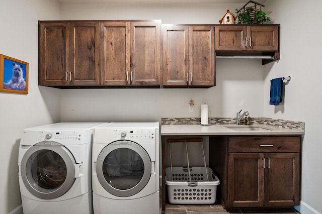 7203 S Tangle Heights Dr, Spokane, WA 99224 - laundry room featuring cabinet space, independent washer and dryer, and baseboards