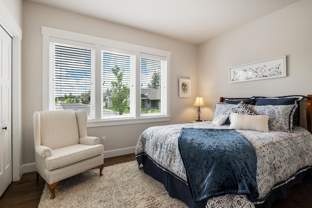 7203 S Tangle Heights Dr, Spokane, WA 99224 - bedroom with baseboards and wood finished floors
