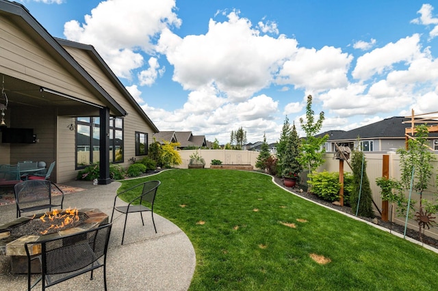 7203 S Tangle Heights Dr, Spokane, WA 99224 - view of yard with an outdoor fire pit and a patio area