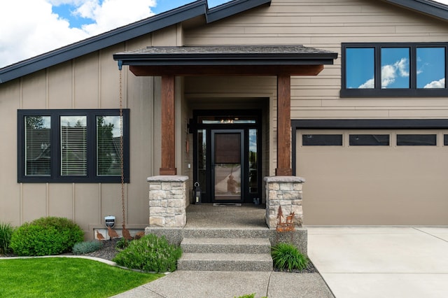 7203 S Tangle Heights Dr, Spokane, WA 99224 - entrance to property with board and batten siding, driveway, and an attached garage