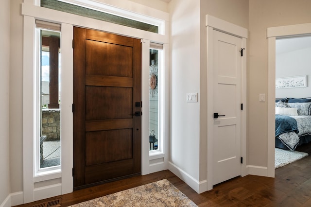 7203 S Tangle Heights Dr, Spokane, WA 99224 - entrance foyer featuring dark wood-type flooring and baseboards